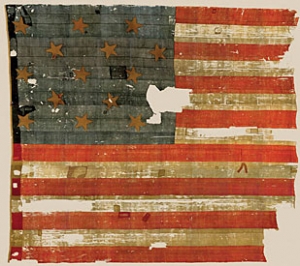 The actual flag flown over Ft. McHenry in 1814 that inspired Francis Scott Key to write "The Star Spangled Banner." The flag has been preserved and is now one of the most treasured artifacts in the collection of the Smithsonian's National Museum of American History in Washington D.C. 